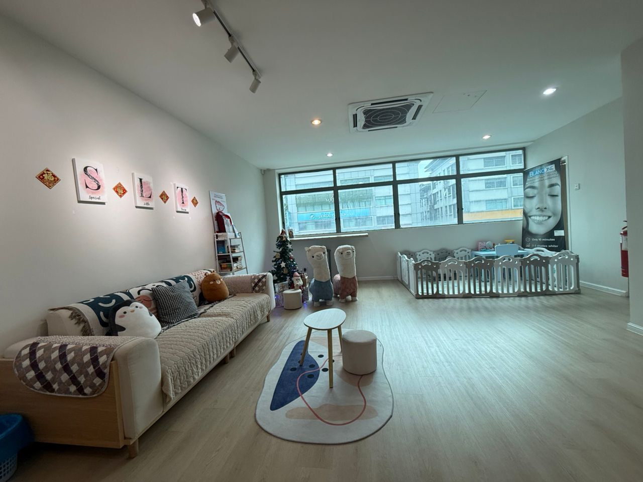 Modern dental clinic waiting area with comfortable seating